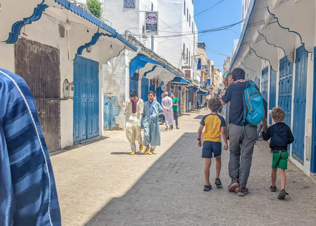 family walking through Essaouira Medina